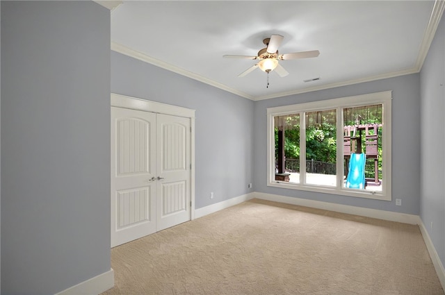 503 Greystoke Cv, Seneca, SC 29678 - carpeted empty room featuring baseboards, ceiling fan, and crown molding