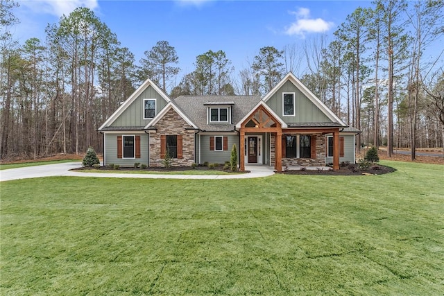 1004 Gaineswood Rd, Anderson, SC 29625 - craftsman inspired home with stone siding, board and batten siding, a front lawn, and a shingled roof