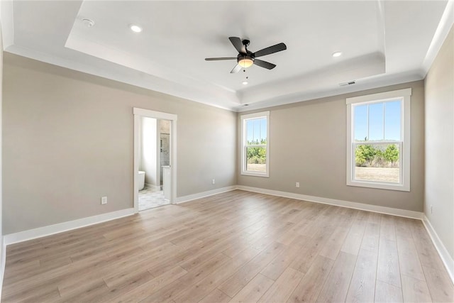 1004 Gaineswood Rd, Anderson, SC 29625 - empty room featuring a raised ceiling, recessed lighting, a ceiling fan, light wood finished floors, and baseboards