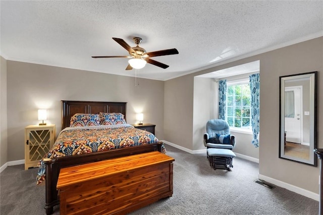 carpeted bedroom featuring a textured ceiling, ornamental molding, baseboards, and a ceiling fan