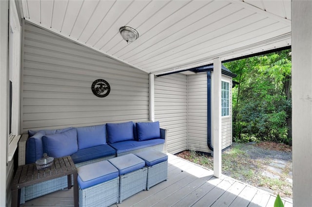 wooden terrace featuring an outdoor hangout area