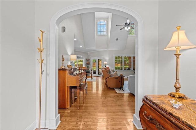 110 Red Maple Cir, Easley, SC 29642 - entryway with a ceiling fan, arched walkways, light wood-style flooring, high vaulted ceiling, and plenty of natural light