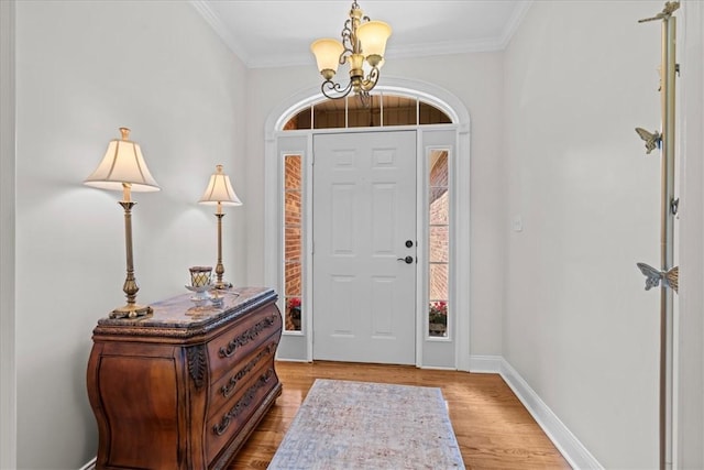 110 Red Maple Cir, Easley, SC 29642 - foyer entrance featuring a chandelier, light wood finished floors, and crown molding