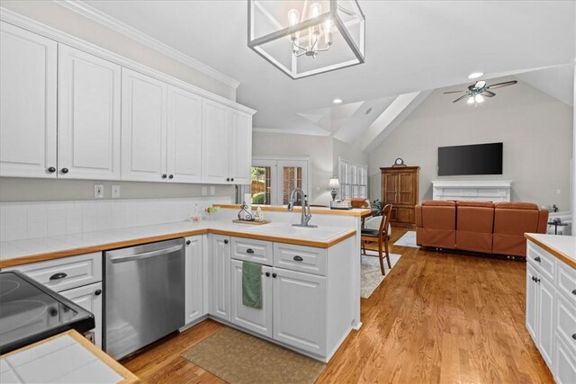 110 Red Maple Cir, Easley, SC 29642 - kitchen featuring stainless steel dishwasher, a peninsula, white cabinets, light wood finished floors, and ornamental molding