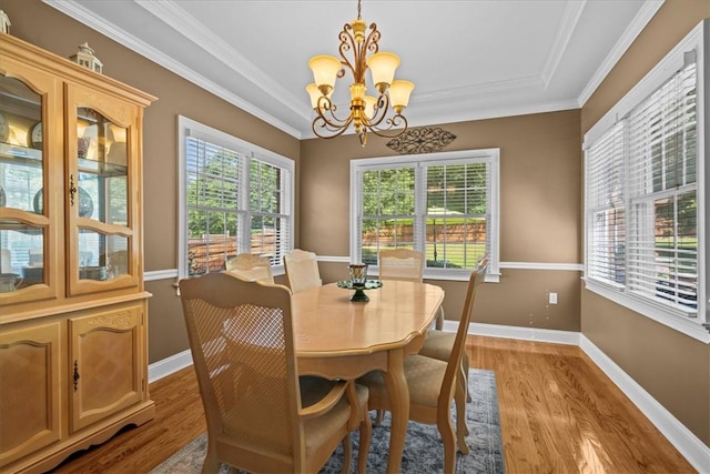110 Red Maple Cir, Easley, SC 29642 - dining space featuring a chandelier, light wood-style flooring, healthy amount of natural light, and crown molding