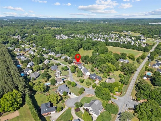110 Red Maple Cir, Easley, SC 29642 - aerial view of property and surrounding area with a heavily wooded area