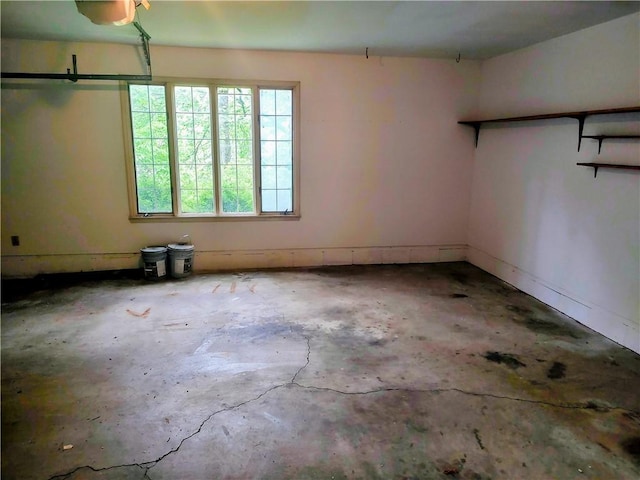 empty room featuring unfinished concrete flooring