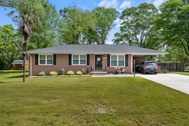 1101 Oak Dr, Pendleton, SC 29670 - ranch-style house featuring an attached carport, concrete driveway, brick siding, and a front yard