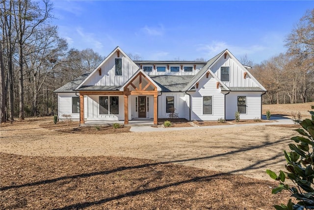 modern farmhouse style home with board and batten siding and covered porch