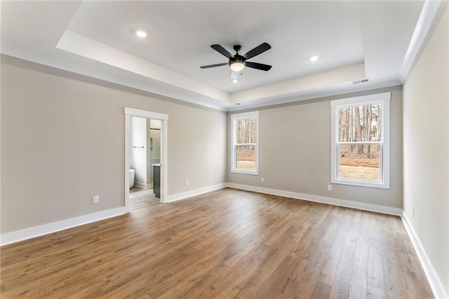 327 Thompson Rd, Taylors, SC 29687 - unfurnished room featuring a tray ceiling, a ceiling fan, wood finished floors, baseboards, and recessed lighting