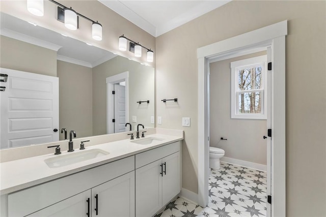 327 Thompson Rd, Taylors, SC 29687 - bathroom with tile patterned floors, toilet, baseboards, ornamental molding, and double vanity