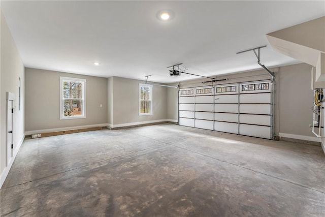 327 Thompson Rd, Taylors, SC 29687 - garage with a garage door opener, baseboards, and recessed lighting