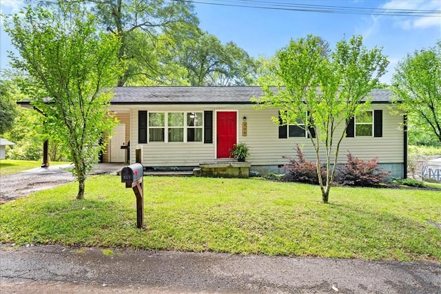 single story home featuring a front lawn, crawl space, and driveway