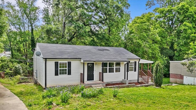 1922 Dobbins Ave, Anderson, SC 29625 - view of front facade featuring a front lawn and a shingled roof