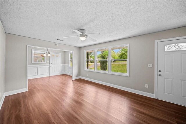1922 Dobbins Ave, Anderson, SC 29625 - entryway featuring ceiling fan, wood finished floors, a textured ceiling, a chandelier, and baseboards