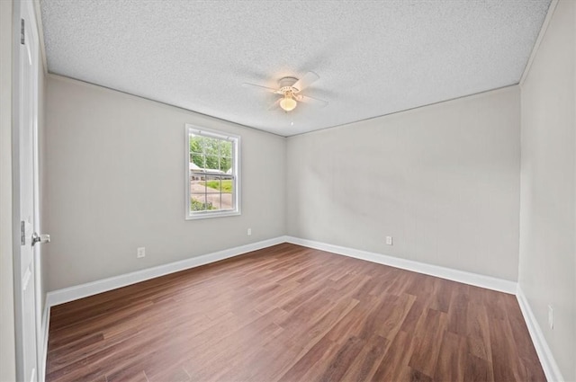 1922 Dobbins Ave, Anderson, SC 29625 - spare room with wood finished floors, ceiling fan, a textured ceiling, and baseboards