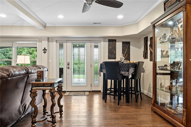 dining room featuring ornamental molding, wood finished floors, a ceiling fan, baseboards, and recessed lighting