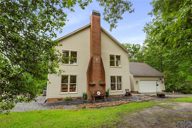 310 Fernwood Dr, Salem, SC 29676 - rear view of house featuring a garage, a chimney, driveway, crawl space, and a lawn