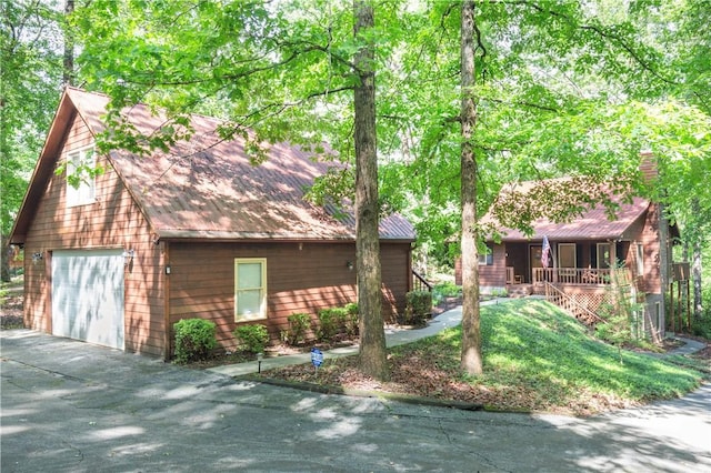 238 Jenkins Mill Dr, Westminster, SC 29693 - rustic home with driveway, covered porch, and a garage