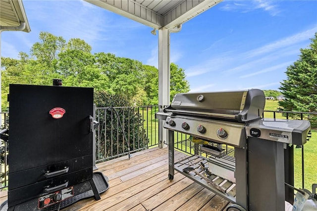 wooden deck featuring grilling area