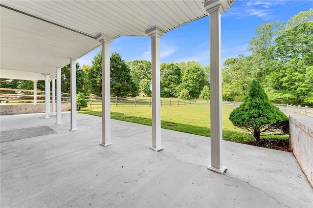 view of patio with view of wooded area