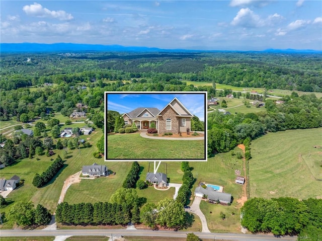 view of subject property featuring a forest and property boundaries highlighted