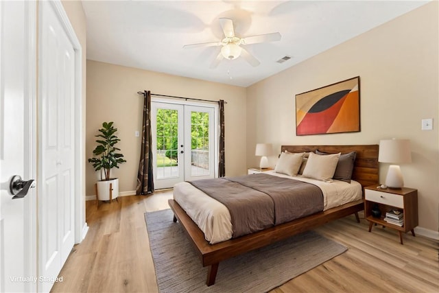 bedroom featuring access to outside, light wood-style floors, baseboards, ceiling fan, and french doors