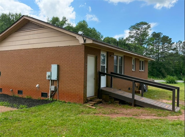105 Sugar Pine Rd, Anderson, SC 29626 - back of property featuring brick siding, a deck, a yard, and crawl space