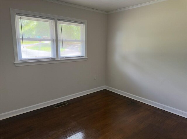 105 Sugar Pine Rd, Anderson, SC 29626 - empty room with dark wood-style flooring, baseboards, plenty of natural light, and crown molding