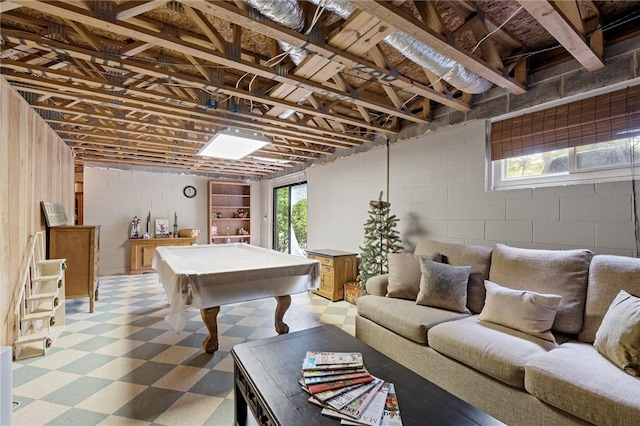 rec room featuring tile patterned floors, concrete block wall, and billiards