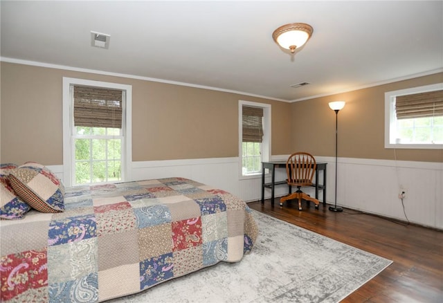 371 Store Rd, Easley, SC 29640 - bedroom with ornamental molding, a wainscoted wall, and wood finished floors