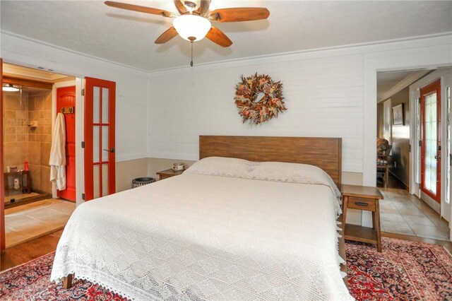 371 Store Rd, Easley, SC 29640 - bedroom with crown molding, french doors, ceiling fan, tile patterned flooring, and ensuite bathroom