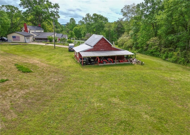 371 Store Rd, Easley, SC 29640 - view of green lawn with an outdoor structure, a barn, and a wooded view