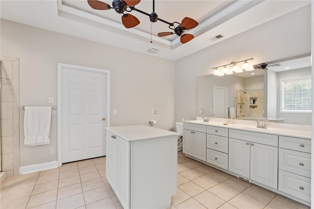 103 Crepe Myrtle Ln, Anderson, SC 29625 - bathroom with ceiling fan, a stall shower, a raised ceiling, double vanity, and tile patterned flooring