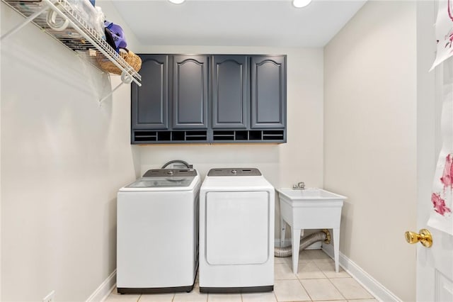 103 Crepe Myrtle Ln, Anderson, SC 29625 - washroom with cabinet space, washing machine and dryer, baseboards, recessed lighting, and light tile patterned floors