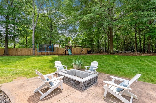 103 Crepe Myrtle Ln, Anderson, SC 29625 - view of patio / terrace featuring a trampoline, an outdoor fire pit, and a playground
