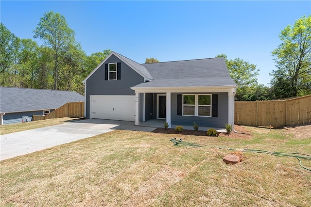 traditional-style house with driveway, a garage, and a porch