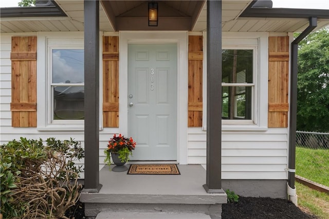 property entrance featuring fence