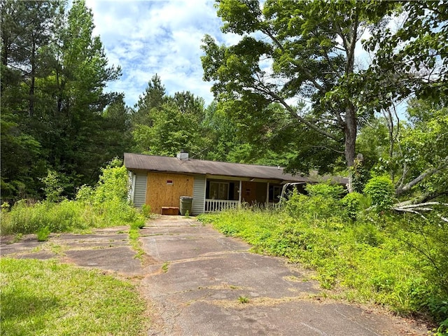 view of front of house with a chimney