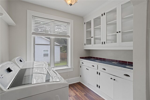 117 Henry Ave, Anderson, SC 29625 - clothes washing area featuring independent washer and dryer, dark wood-style flooring, baseboards, and cabinet space