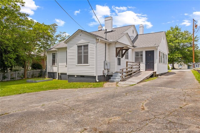 117 Henry Ave, Anderson, SC 29625 - view of front of property featuring a chimney, fence, and roof with shingles