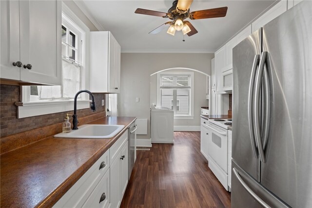 117 Henry Ave, Anderson, SC 29625 - kitchen featuring stainless steel appliances, a sink, washer / dryer, arched walkways, and ceiling fan