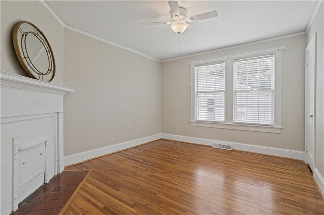 117 Henry Ave, Anderson, SC 29625 - unfurnished living room featuring a ceiling fan, wood finished floors, ornamental molding, and baseboards