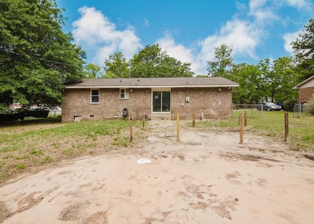 4709 Mcdonald Ave, West Columbia, SC 29172 - back of house with fence and brick siding