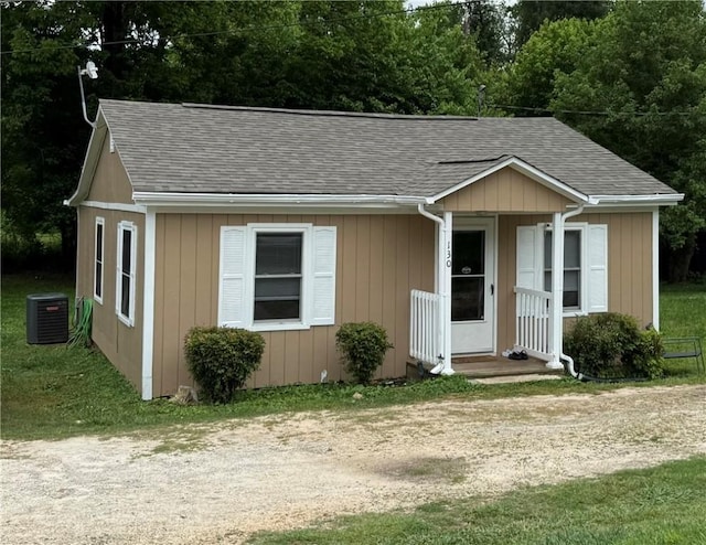 130 Marshall Ave, Seneca, SC 29678 - view of front facade featuring a shingled roof, cooling unit, and covered porch