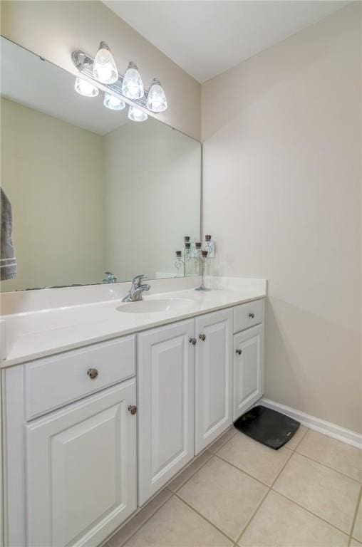 606 Greening Dr, Simpsonville, SC 29681 - bathroom featuring tile patterned floors, vanity, and baseboards