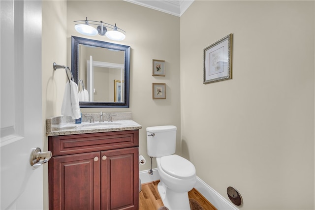 117 W Waters Edge Ln, West Union, SC 29696 - bathroom featuring ornamental molding, wood finished floors, toilet, vanity, and baseboards
