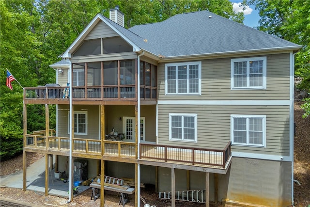 117 W Waters Edge Ln, West Union, SC 29696 - back of house featuring a chimney, a deck, a sunroom, and a patio
