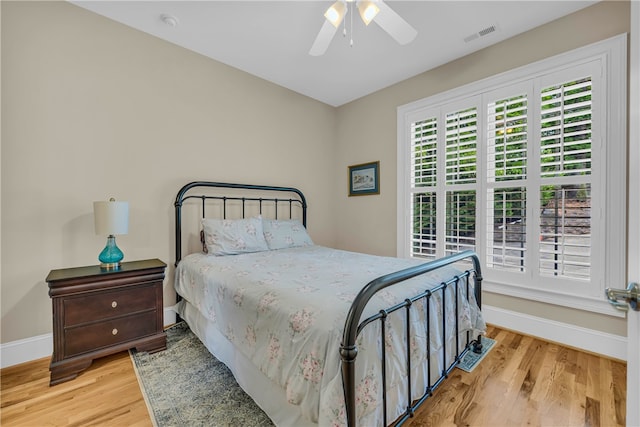117 W Waters Edge Ln, West Union, SC 29696 - bedroom with wood finished floors, baseboards, and ceiling fan