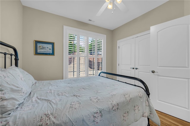 117 W Waters Edge Ln, West Union, SC 29696 - bedroom with wood finished floors, a closet, and a ceiling fan